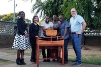 Photo of KMC furniture project collaborators in Malawi