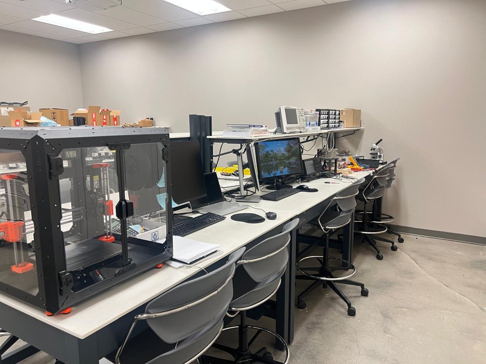 Sublime Lab prototyping space with 3D printer and workstations