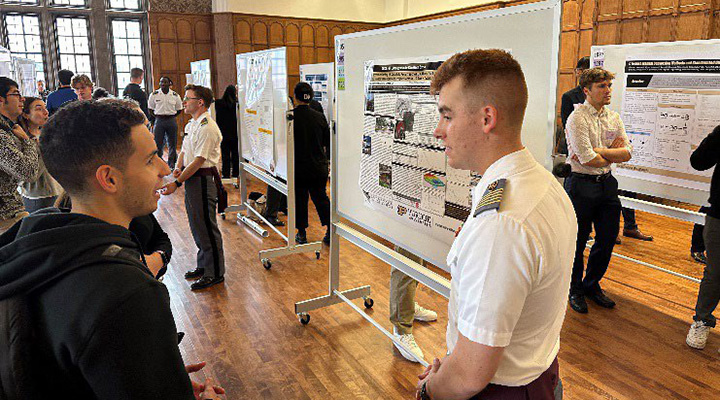 Cadet giving poster presentation