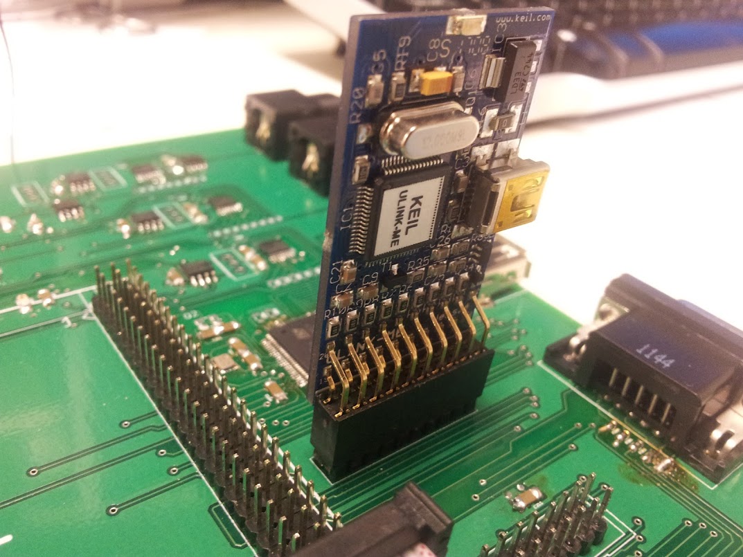 Power up the full board, Plugged in jtag programmer, loaded program into MCU. Successfully toggled a pin. Verified the Controller is working.