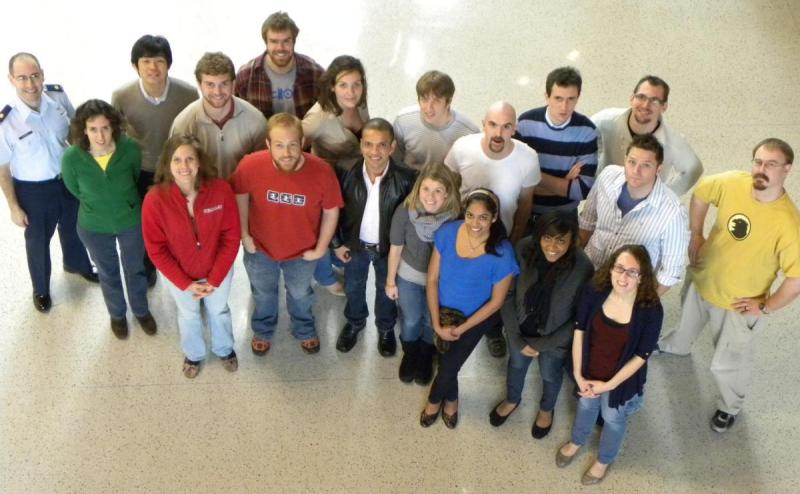 The research group in the Armstrong Hall atrium, December 2012. Left to right: Chris Geisel, Lucia Capdevila, Masaki Kakoi, Amanda Haapala, Galen Harden, Ted Wahl, Chris Spreen, Mar Vaquero, Rohan Sood, Amanda Knutson, Tom Pavlak, Ash Das, Jeff Stuart, Bonnie Prado Pino, Davide Guzzetti, Tash Bosanac, Wayne Schlei, Loic Chappaz, and Cody Short.