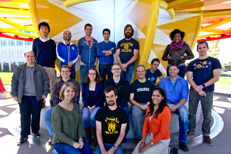 The research group gathered at Purdue's VOSS sculpture (Visiting Our Solar System; named in honor of the late Janice Voss, astronaut and Purdue alumna). Back row: Shota Kikuchi, Rohan Sood, Alex van Anderlecht, Kia Tajdaran, Ted Wahl, Davide Guzzetti, Bonnie Prado Pino. Middle row: Diogo Merguizo Sanchez, Robert Pritchett, Tash Bosanac, Cody Short, Chris Spreen, Wayne Schlei, Loic Chappaz. Front row: Emily Zimovan, Andrew Cox, Ash Das-Stuart.
