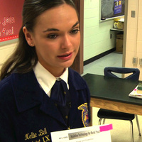 Nellie Bell (FFA) teaches students about farming with a disability